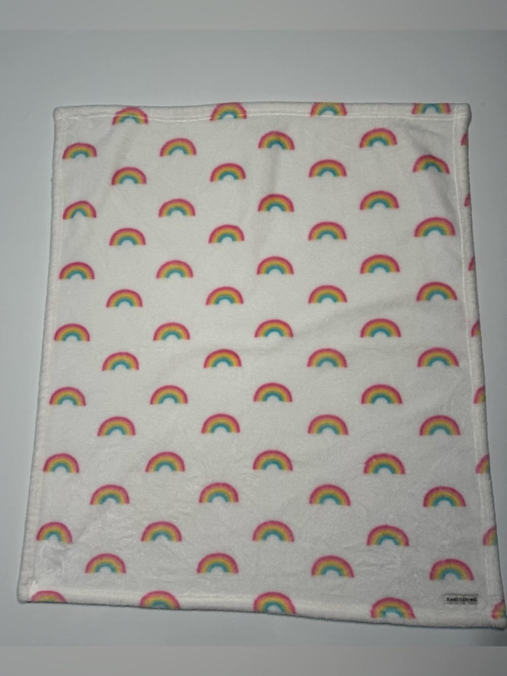 Blankets & Beyond Rainbow White Plush Blanket 32x28
